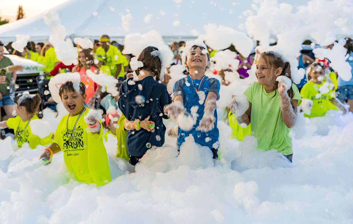 Kids playing in foam cannon party